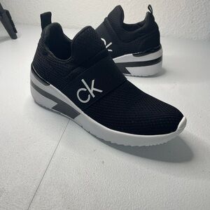 Calvin Klein KCDELFI-R Women’s Black/White Mesh Slip-On Wedge Sneaker-Size: 7M
